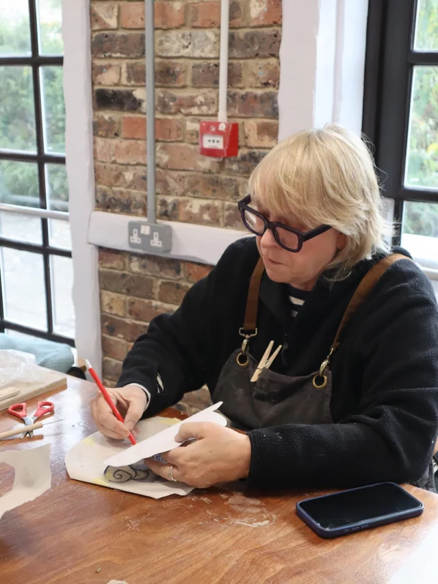 Follow along the process! Lou from our Wednesday morning class shows us how transferring designs onto the clay is a beautiful way to decorate.