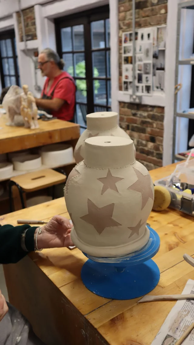 A starry pair of lamps! These beautiful lamps, made by Sue Pittman, are carefully detailed with stars in our salmon slip, with a beautiful dotted texture added on top. We can’t wait to see them wired up.