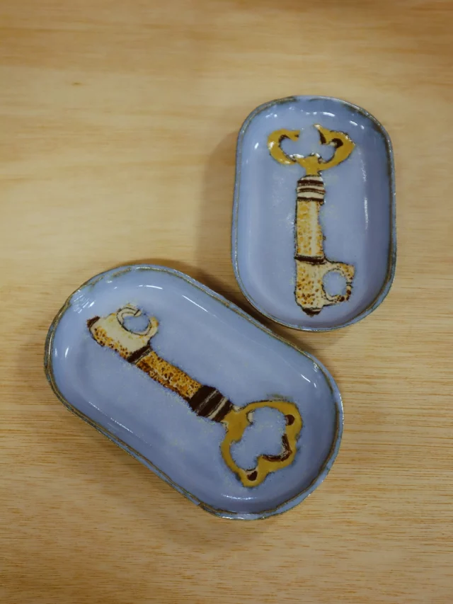 These two beautiful little dishes featuring keys were made by Jeff, our marvellous nonagenarian potter. 
His surname is Keys and these were gifts for his two daughters for them to keep their keys on, so it’s keys for Keys!