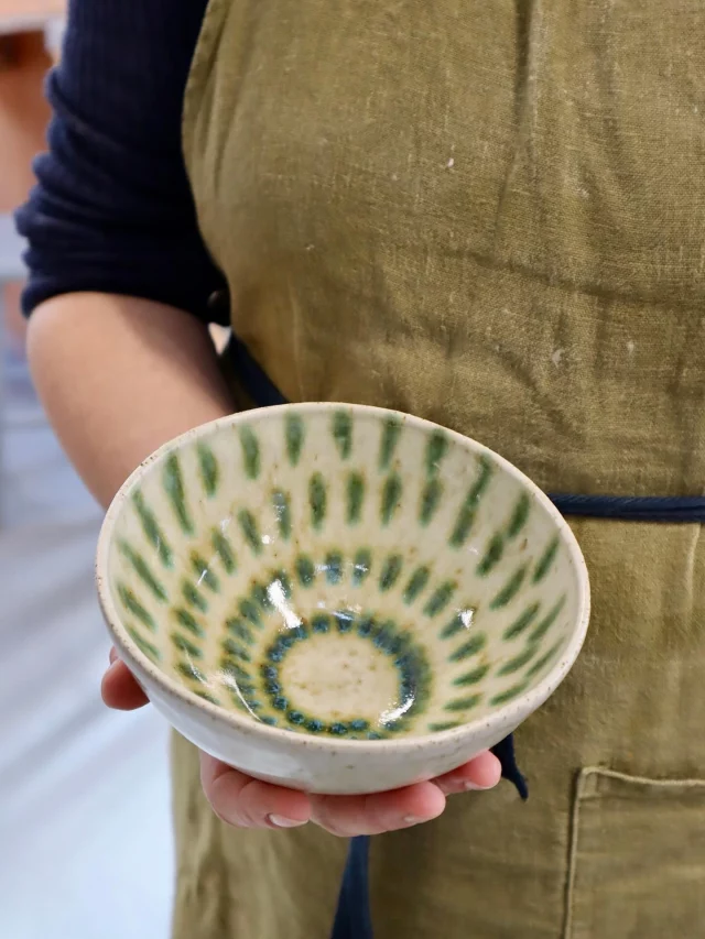 A lovely balance between simple form and expressive glaze work. A beautiful, calming bowl made by Rob, detailed with copper carbonate with our oatmeal glaze.