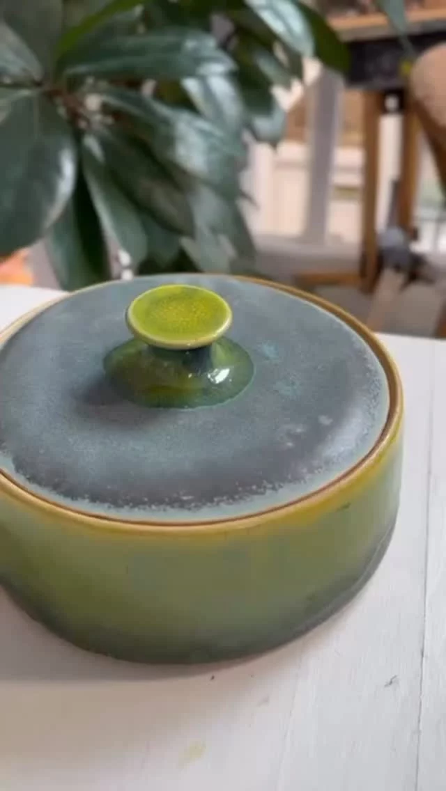 A beautiful low lidded dish. thrown by one of our students. This looks like it’s been glazed in turquoise and yellow.