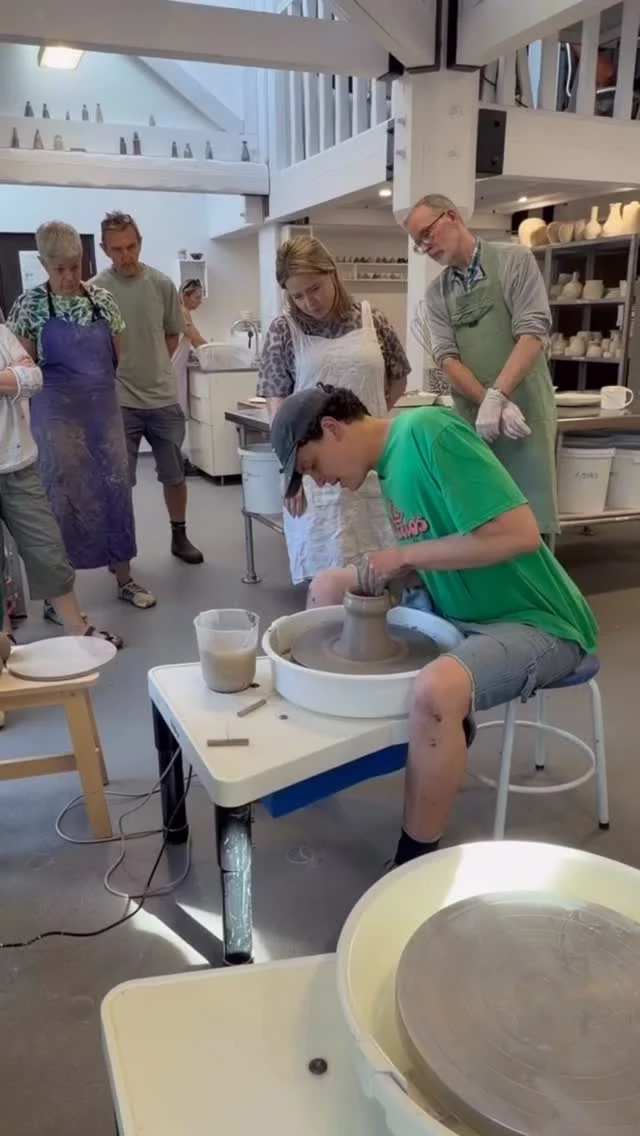 Here’s Cellan demonstrating his technique to one of our weekly classes on throwing a classic jug shape. This one has a wide lip to enable two matching beakers to stack inside. 
Our optional project this term is Jugs & Carafes and we are already seeing some wonderful examples made by students coming through the kilns. We’ll be posting a gallery of them on here soon!