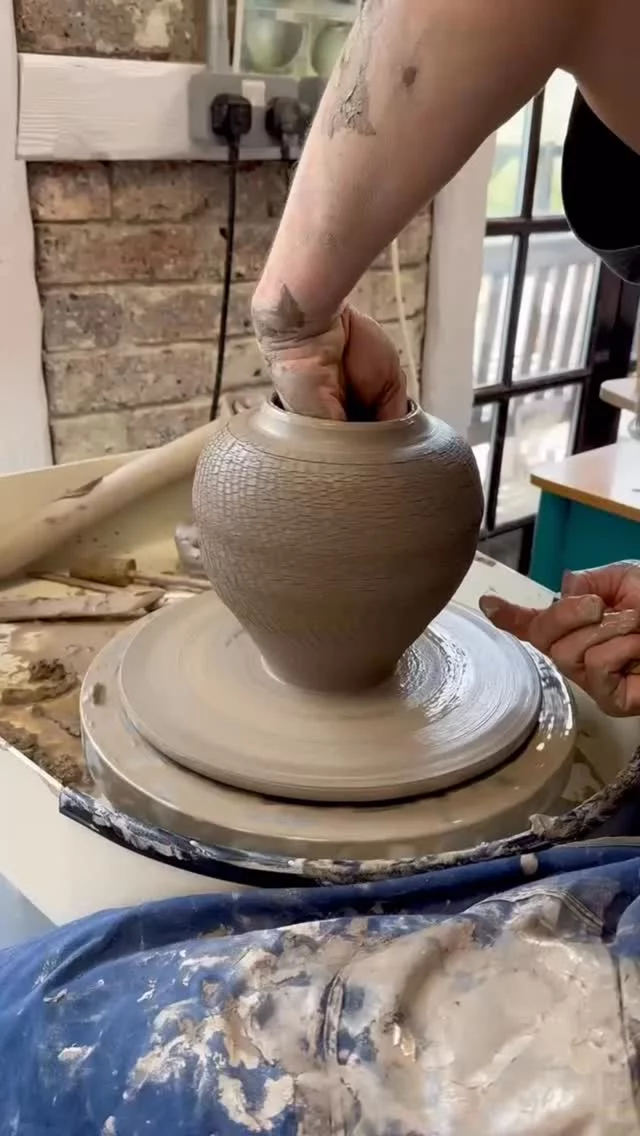 One of our more experienced throwers having fun with sodium silicate. Beautiful vase shapes too.