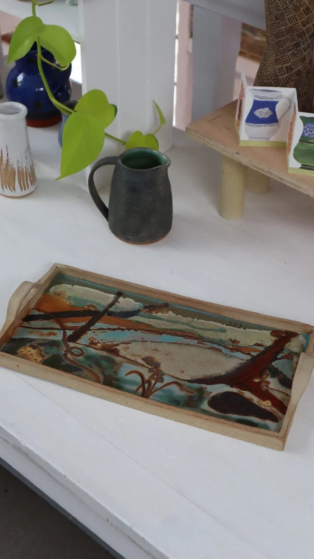 An amazing amount of work has gone into creating this beautiful tray, glazed with a landscape scene with wonderful details.
By Amanda from our Friday Morning class.