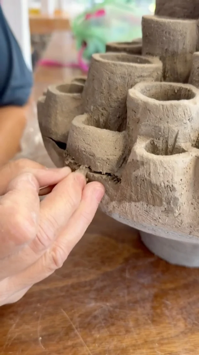 You may have seen the reel we shared a few days ago showing Kerrie’s @kerriekent.art @goldheartedclub latest work, which will be a feature in her first solo show ‘Awaken’, taking place @grovegallerytw 17-30 Sept.
Cracks can happen, sometimes suddenly, and due to a number of reasons. So much love and work had gone into this piece we knew we had to try and save it for Kerrie.
Susana @susanagarciaceramics spent some time working on the repair to give it the best chance in the kiln. Glad to say it worked wonders. The piece is now out of both firings and is fantastic. All will be revealed soon. 
Here’s our method for repairing greenware cracks that have already dried out. 
Take the same dry clay as the item to be repaired (in this case Crank), and break up in small bits, then mix with white vinegar to form a paste.
Using a paint brush, dab vinegar onto the split cracks to moisten the place of mending.
Score and scratch well, then gently fill the cracks with the paste. A knife is the best tool here, easing it in to make the surface look good.
Using a kidney and knife scrape and fill a few times. 
Once the surface is finished, cover with cling film for a few days. Keep checking to see if the crack has re appeared. 
If it has, then repeat the process.
Have you tried this method? Let us know what you think.